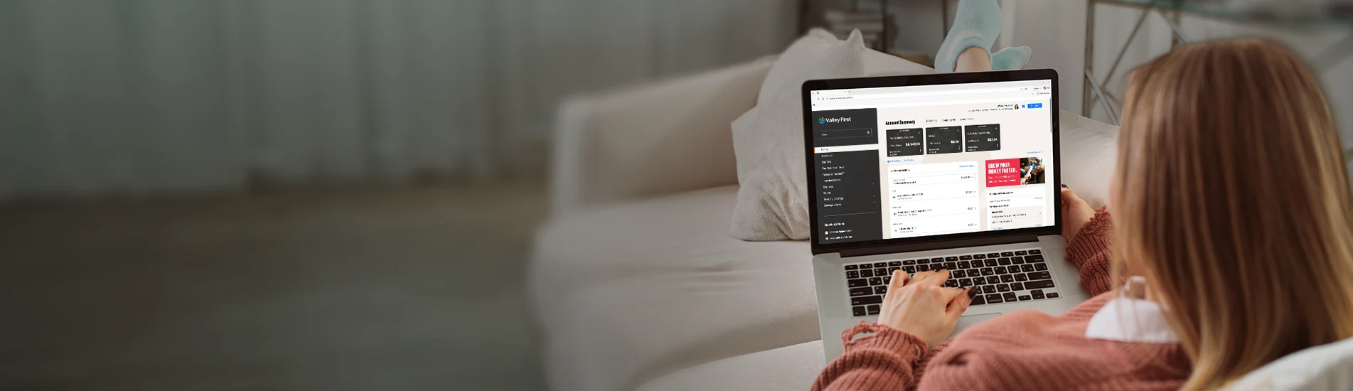 girl on laptop on couch