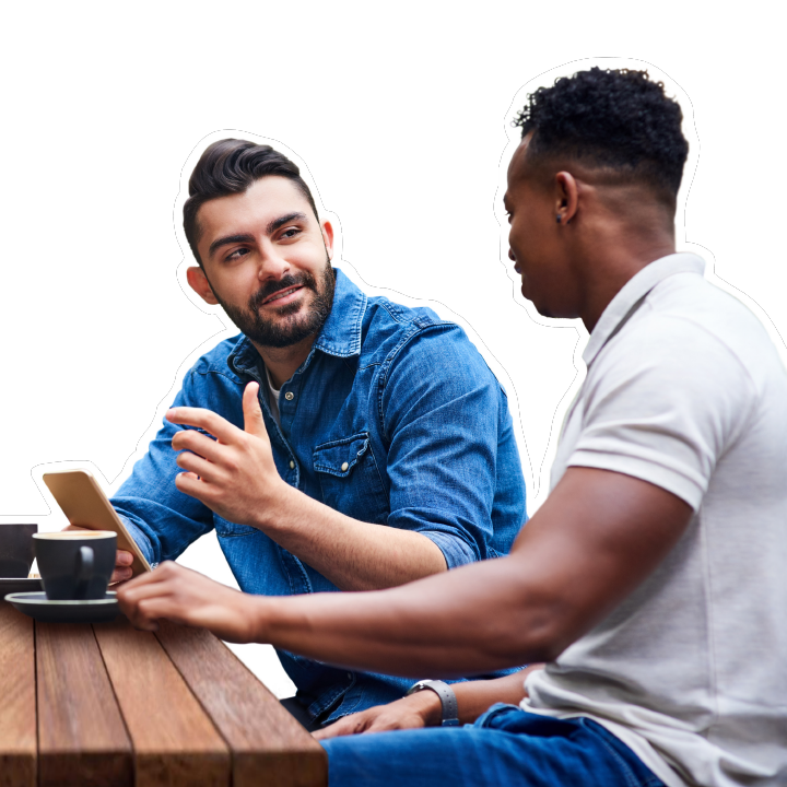 two men chatting over coffee