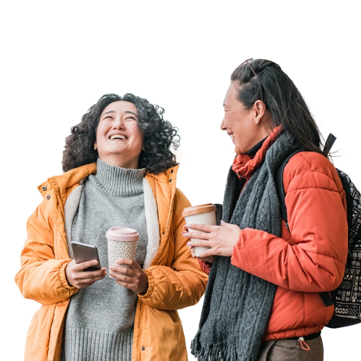 two women chatting over coffee